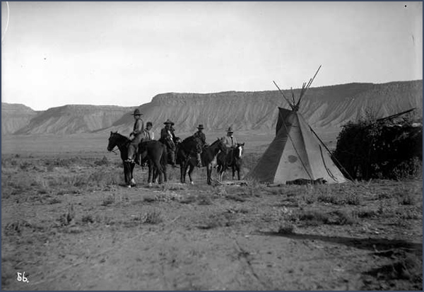 Ute horsemen, brush shelter, and teepee. Courtesy Denver Public Library, Western History Collection, H. S. Poley, P-81.