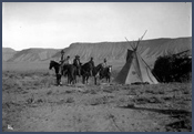 Ute horsemen, brush shelter, and teepee. Courtesy Denver Public Library, Western History Collection, H. S. Poley, P-81.