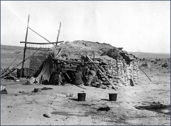 Circular masonry hogan. Used by permission of Fort Lewis College, Center of Southwest Studies, Southwest Colorado General Photograph Collection, SWP 001 IV-02-10.