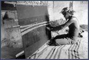 Man weaving on loom. Courtesy Denver Public Library, Western History Collection, X-30906.