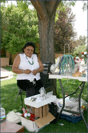 Navajo woman making and selling jewelry. Photo by Joyce Alexander; copyright Crow Canyon Archaeological Center.